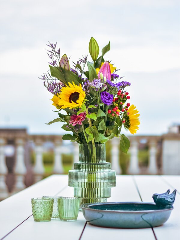 Overdag kun je ontspannen op het dakterras aan het verwarmde zwembad
